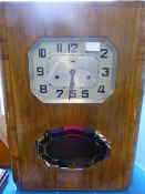 Art Deco Wall Clock, Carrillon Romanet Morbier Clock in a square case. Numeric dial.