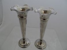 Pair of silver bud vases, Birmingham hallmark, dated 1905/6, m.m M. Bros, 17 cms.