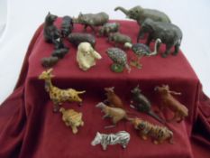 Collection of Lead Farmyard animals including an elephant, rhino, cow and calf, bears, kangaroo,