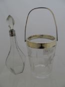 Silver Plated Miniature Ice Bucket together with a silver collared cut glass bottle.