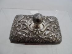 Solid Silver Ink Blotter, the blotter having repousse work with doves and masks within a foliate