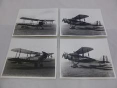 A collection of vintage black and white photographs depicting various bi-planes