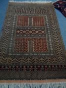 A vintage wool Afghan Hatchli design rug approx. 6ft 2" x 4ft 2"