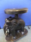 Kenyan Elephant Table circa 1950, hard wood, hand carved table with foliate decoration to the