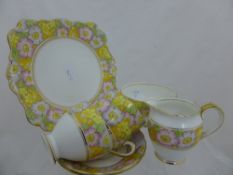 Roslyn China Tea Set comprising eleven cups, twelve saucers, twelve tea plates, two cake plates.