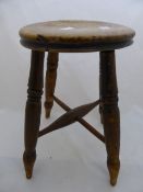 Antique Oak Stool on turned legs with crossed stretchers.