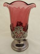 A solid silver flower vase, Chester hallmark, with cranberry glass liner, the vase having a hand