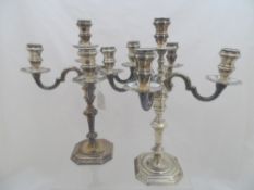 A pair of Italian silver candelabrum, being four branches, stamped 800 to base, 1400 gms in total.