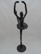 Metal Figure of a Ballerina wearing a tutu, approx. 28 cms. tall.