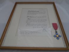A C B E awarded to Warwick Nevison Squire Esquire presented by Queen Elizabeth II in 1982, the C B E
