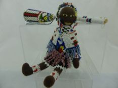 Miscellaneous Collection of Tribal Items including a Zulu doll with beaded skirt and headdress, trio