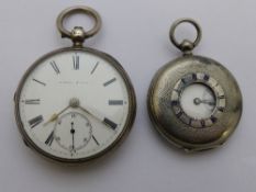 A Gent`s solid silver Chester hallmark pocket watch by Kendall and Dent together with a smaller