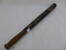 An antique W R IV truncheon having painted decoration.