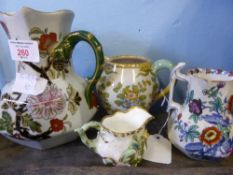 Miscellaneous Pottery and Porcelain including a Faience jug, Mason jug, Booths jug and one other
