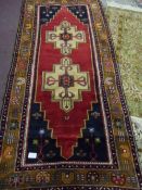 A Turkish Yahtali runner approx. 8ft 4" x 4ft 11"