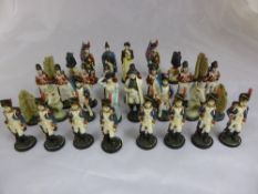 A Chess Set - the pieces being in the form of resin model soldiers, the soldiers being French and