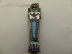 A silver metal and enamel retracting pencil in the form of an Egyptian sarcophagus.