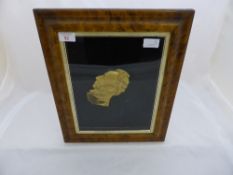 Victorian Profile of a Gentleman raised and gilded in a period frame.