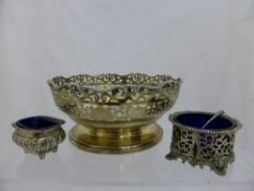 A solid silver Birmingham hallmarked fruit bowl having lattice work design with scalloped edge,