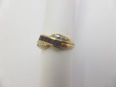 A lady`s 9 ct yellow gold diamond and amethyst ring, 4x 1pt diam. 3.1gms. size O