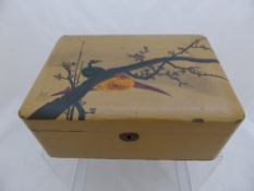 An oriental lacquer box depicting pheasants