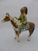 A Beswick figure of a Native Indian on horseback.