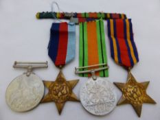 Collection of medals incl. 1939-45 War Medal, 1939-45 Star and a Burma Star, and a ribbon with oak