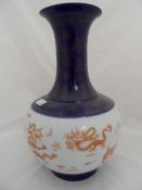 Chinese Baluster Vase, the vase having Cobalt blue neck and base with white central frieze depicting
