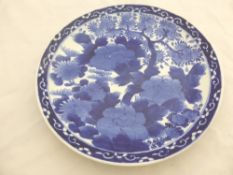 Circa 19th Century Chinese Blue and White Charger, the charger depicting cherry blossom and