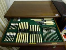 An oak cased canteen of silver plate cutlery comprising twelve large forks, twelve teaspoons, eleven