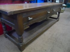 Oak Coffee Table with two drawers and decorative edging on turned legs and full stretchers.