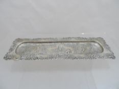 Solid Silver Pen Tray, with foliate design depicting cherubs at play, marks rubbed, 80 gms.