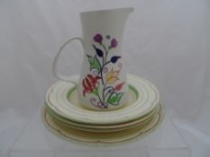 Clarice Cliff Plates, Reg 840076 together with a Poole Pottery Vase - floral decoration on a cream
