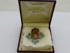 A solid silver and enamel British Empire brooch having Brittania to central cartouche