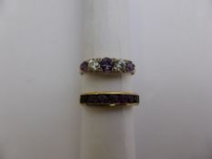 A lady`s 9 ct gold amethyst and cz ring, 1.7 gms size S together with a lady`s 9 ct amethyst channel