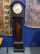 A grandmother clock together with a mahogany cased mantle clock (2)