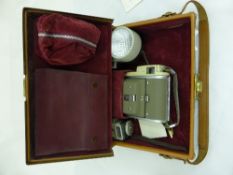 Vintage Polaroid Camera, the camera with fittings in an original leather case.