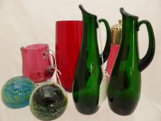 Misc. collection of cranberry glass incl a sugar shaker, milk jug, tankard and two green vases and
