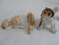 Three Russian ceramic figures " Lomonsov " a tiger cub, a fawn and a lion cub ( chip to one ear)