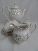 Johnson Bros Floral Tea Set comprising Coffee Pot, twelve tea cups and eleven saucers, one lidded