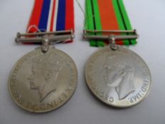 Second World War boxed War and Defence Medals with slip to Miss D Edwardson ATS.