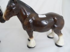 Two ceramic figures of shire horses