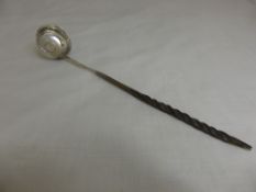 George IV White Metal Spirit Ladle, the ladle with George IV six pence impressed to bowl.