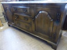 A large reclaimed Oak Sideboard features three central drawers and two cupboards either side 166 x