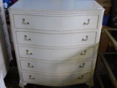 Olympus Chest of Drawers the cream and gilded Serpentine fronted chest with five drawers.