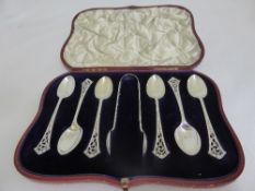 A set of six silver teaspoons and sugar tongs, Sheffield hallmarked, dated 1889 - 1900, in the