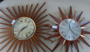 A 1970`s Anstey & Wilson wall clock in the form of a sunburst together with a similar Metamec wall