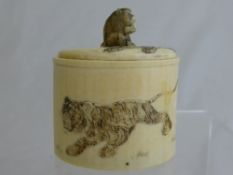 Oriental Ivory Trinket box, the box having engraved figures of prowling tigers to both sides, the