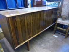 Danish Design Rosewood Sideboard, the sideboard features sliding doors, internal shelves, measures