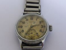 A Timor World War stainless steel wristwatch inscribed A T P 149989 having a fifteen jewel Swiss